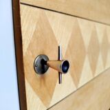 Wooden sideboard in soft green