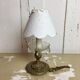 Ancient cave lamp in gilded bronze