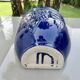 Wall pot in glazed blue terracotta with a grape design, 1970s.