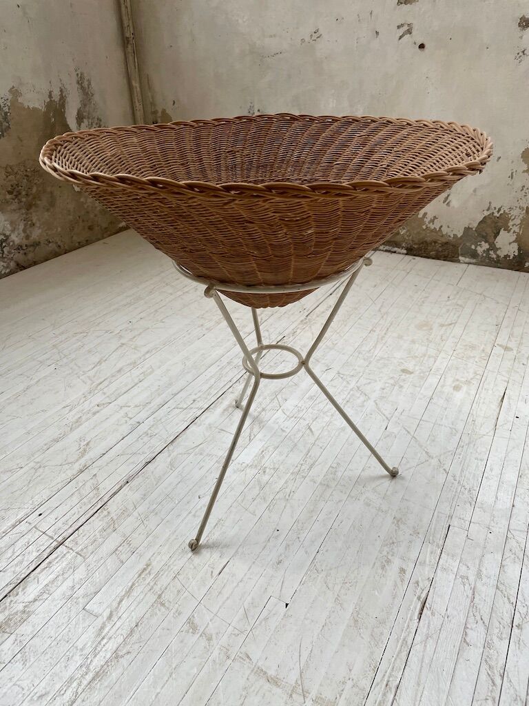 Wicker garden basket on tripod support