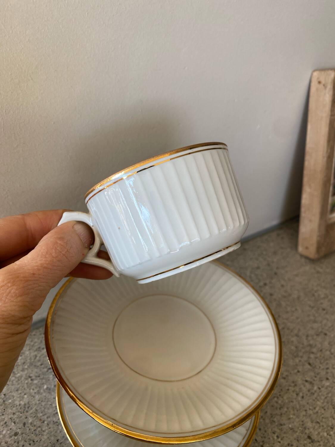 3 white and gold tea or chocolate cups