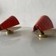 Pair of orange plexiglass and curved brass wall lights, 1950s, Germany