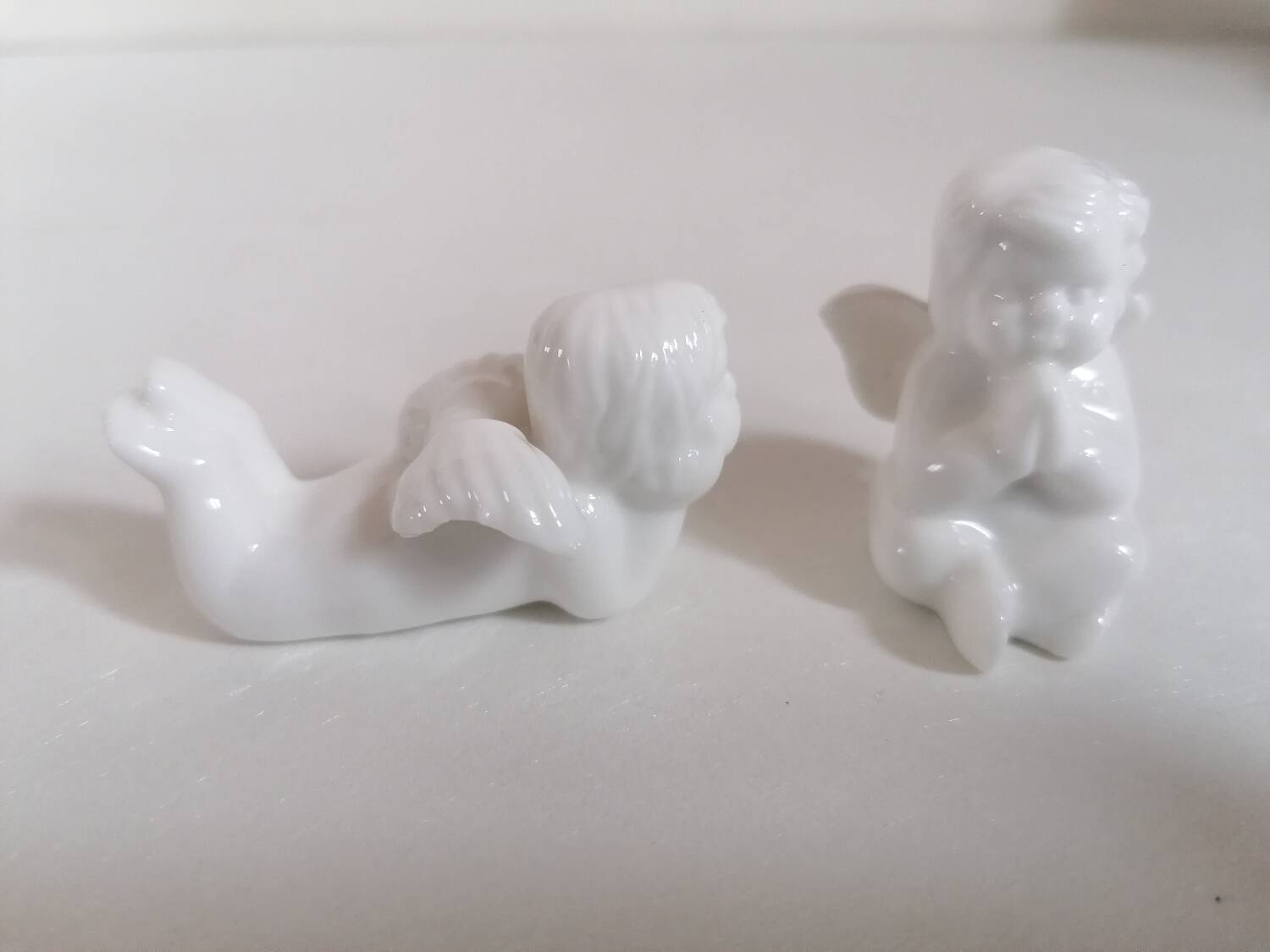 Lot 6 knife holders and 6 porcelain place markers putti angels