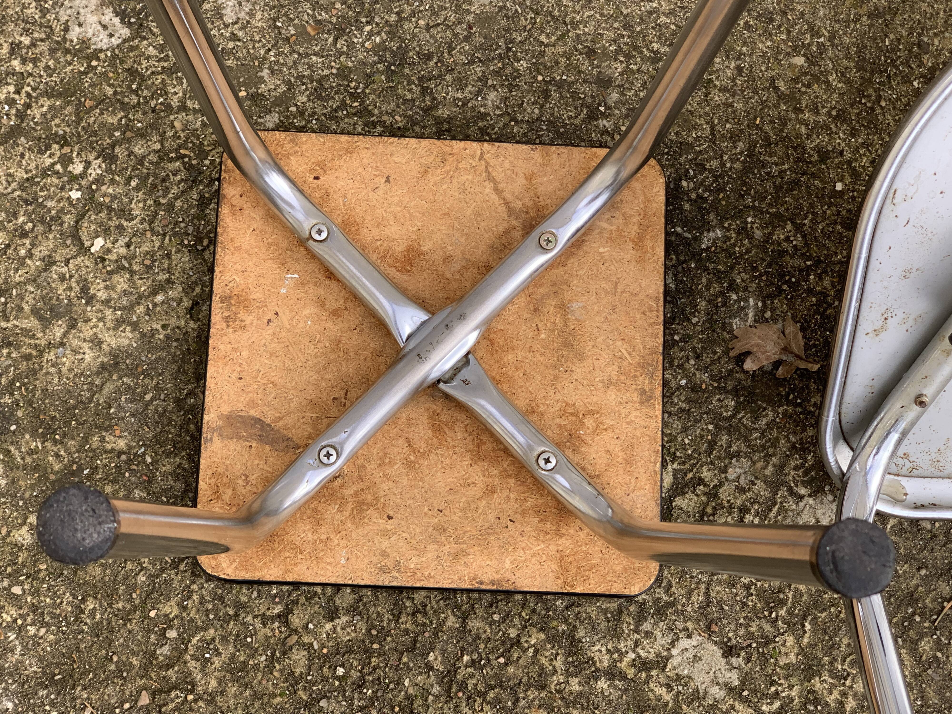 Mismatched formica chairs and stool 1960