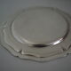 Round plate, Chinon collection with gold trim, Christofle, and its protective felt pouch.