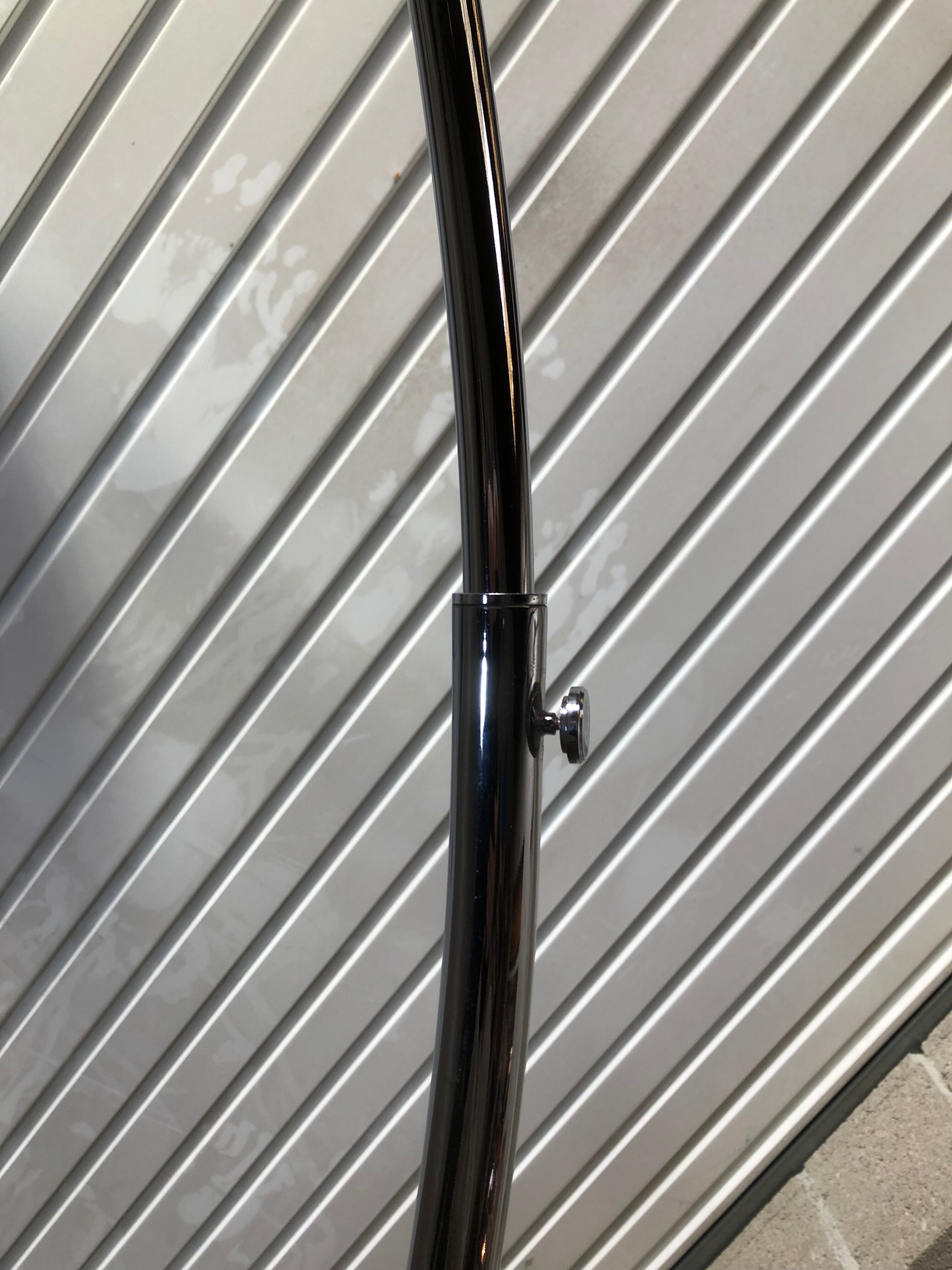 Arc floor lamp design of the 80s