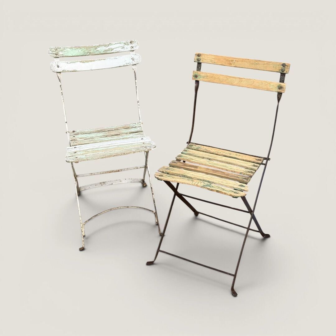Bistro tables and folding chairs with a patina from the original 1930s.