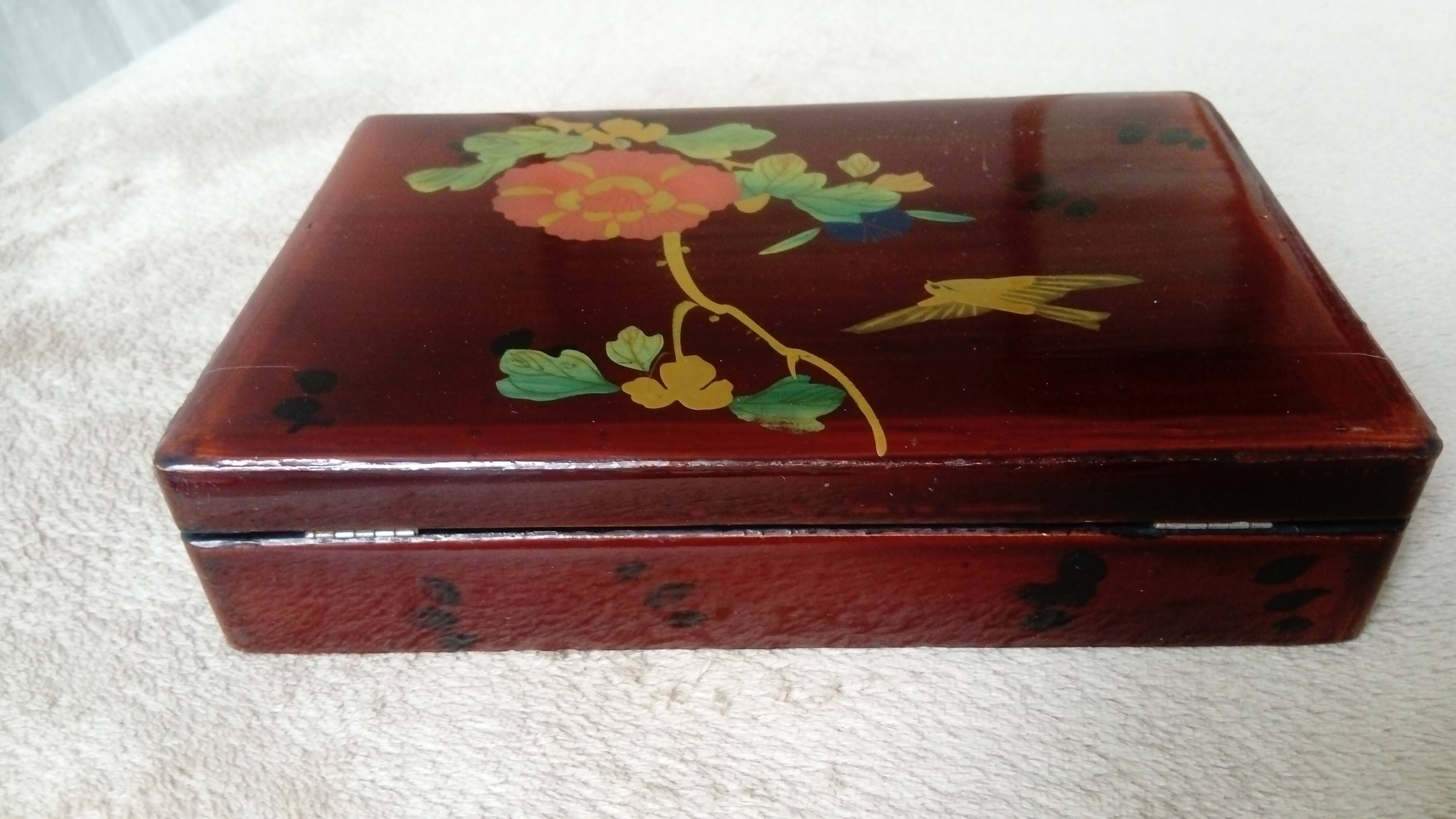 Old lacquered wooden box with china or japan decoration, bird and flower