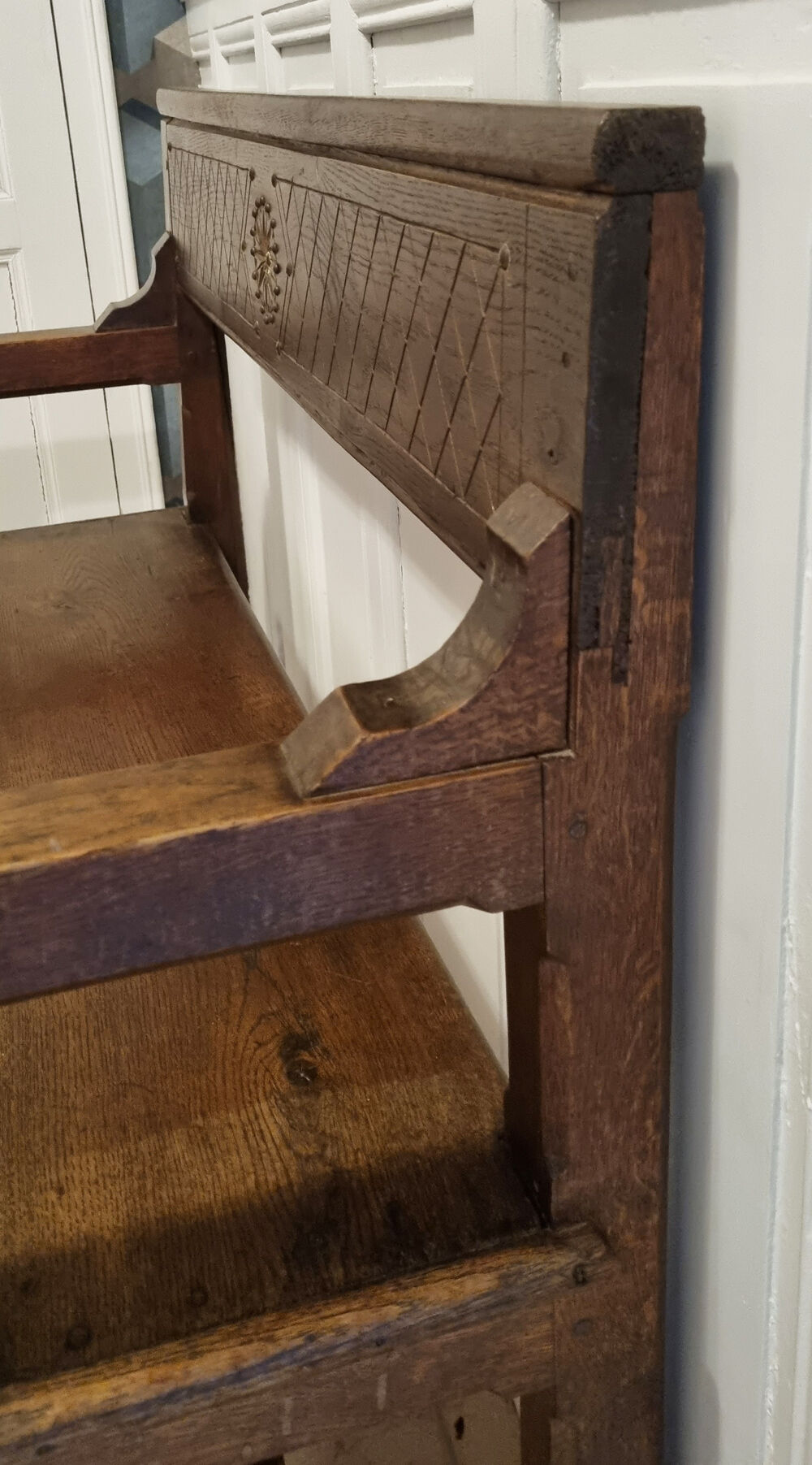 Stylized church pew, early twentieth century, solid wood