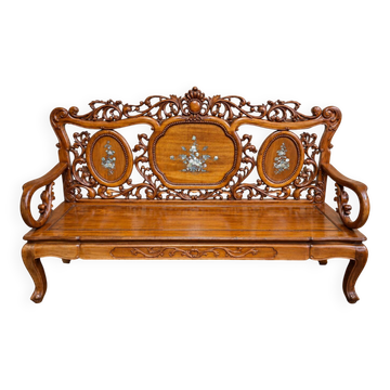 Pair of Asian armchairs in carved wood with mother-of-pearl inlays.