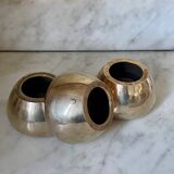 Three brass candlesticks