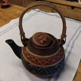 Old terracotta teapot