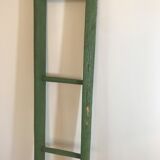 Former small vintage green ladder