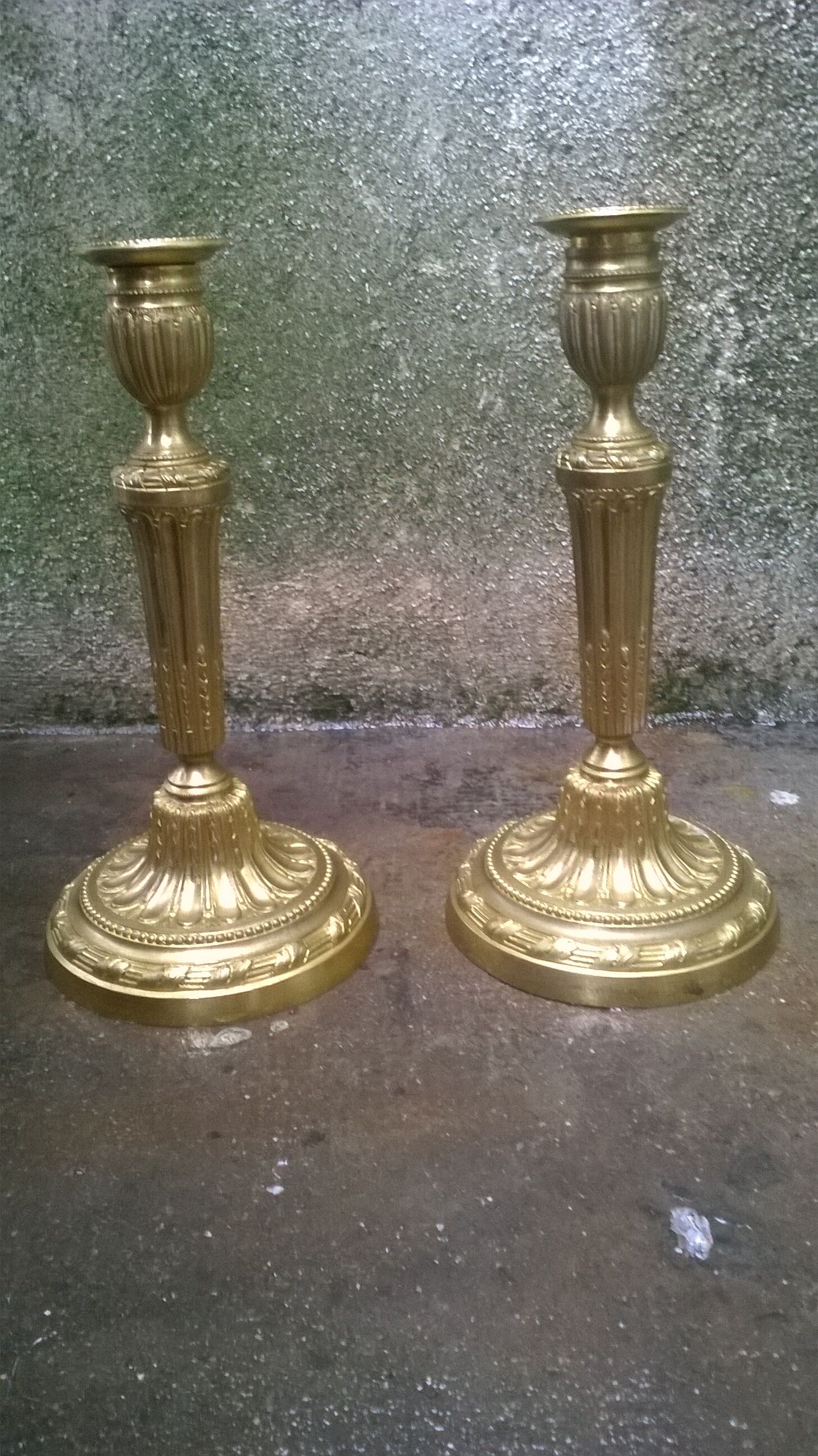Pair of golden bronze candlesticks