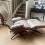 Armchair and footrest by Charles & Ray Eames