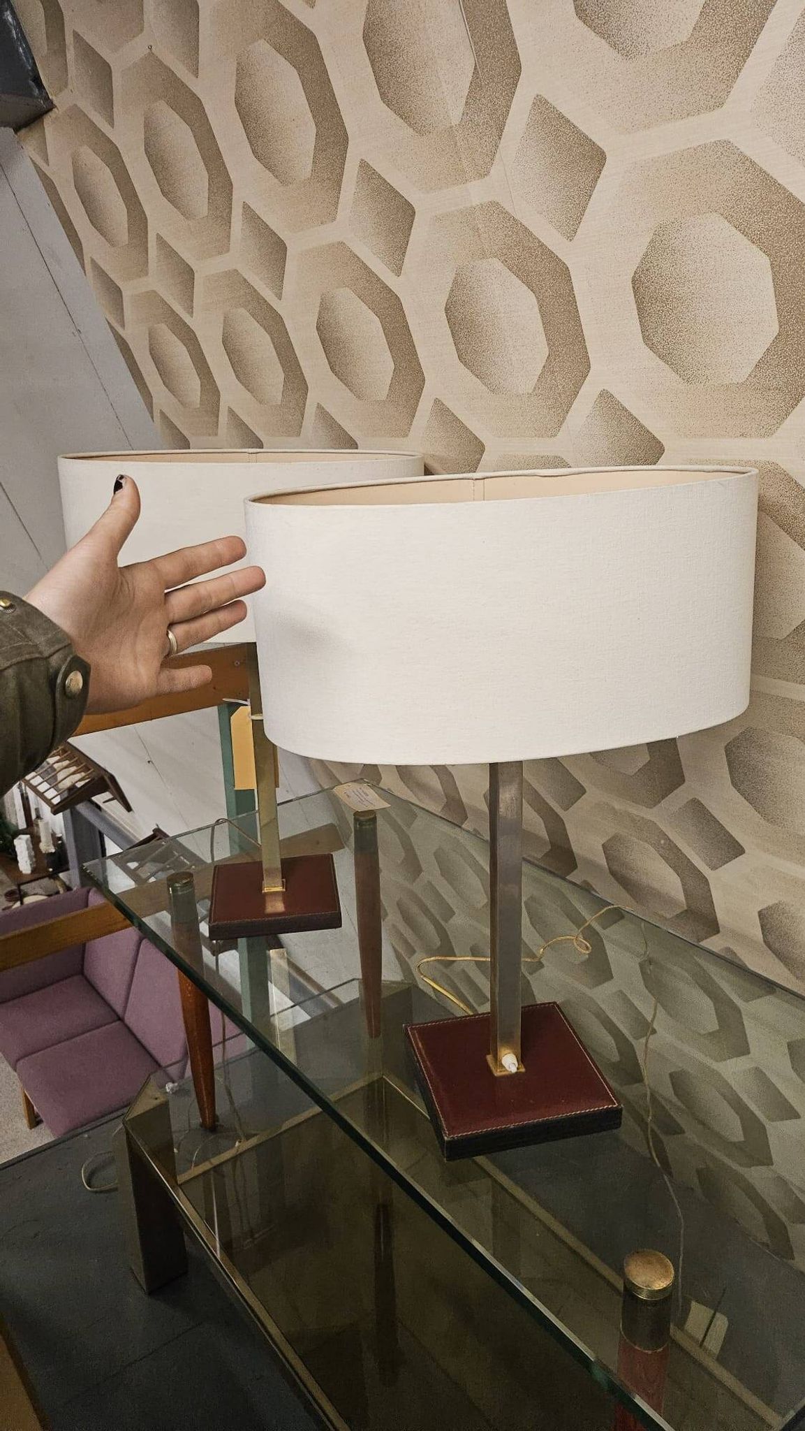 Pair of leather and brass table lamps from the 1960s, originating from Belgium.