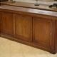 Mahogany workshop furniture with three sliding doors from the 1920s.