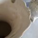 White dabbling vases with capodimonte porcelain floral decoration