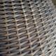 Large woven rattan armchair