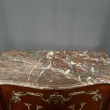 Louis XV style commode. Marquetry, gilded bronze decoration.