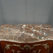 Louis XV style commode. Marquetry, gilded bronze decoration.