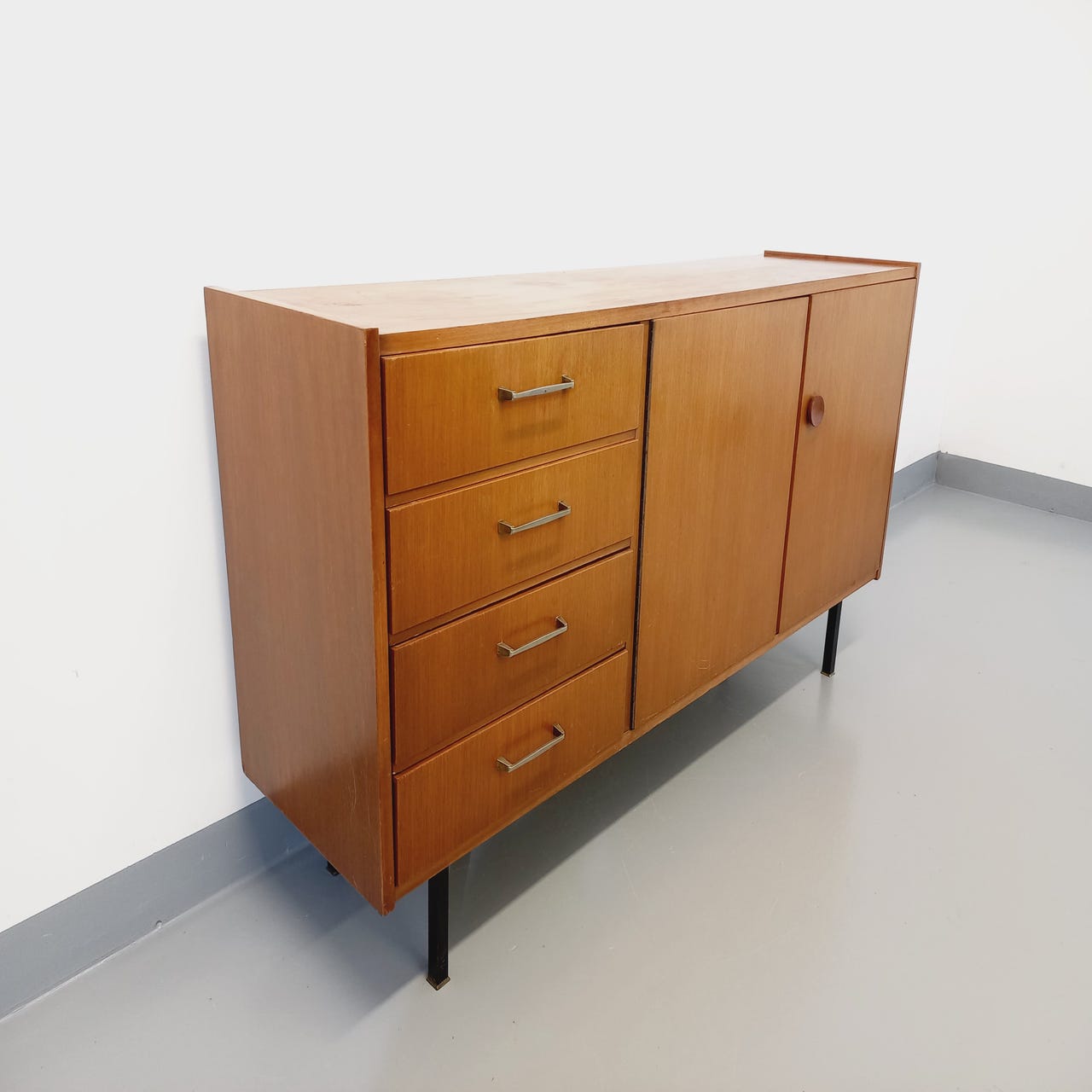 Vintage teak and black metal row from the 60s