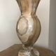 Vintage vase in marbled onyx stone shades of beige and brown