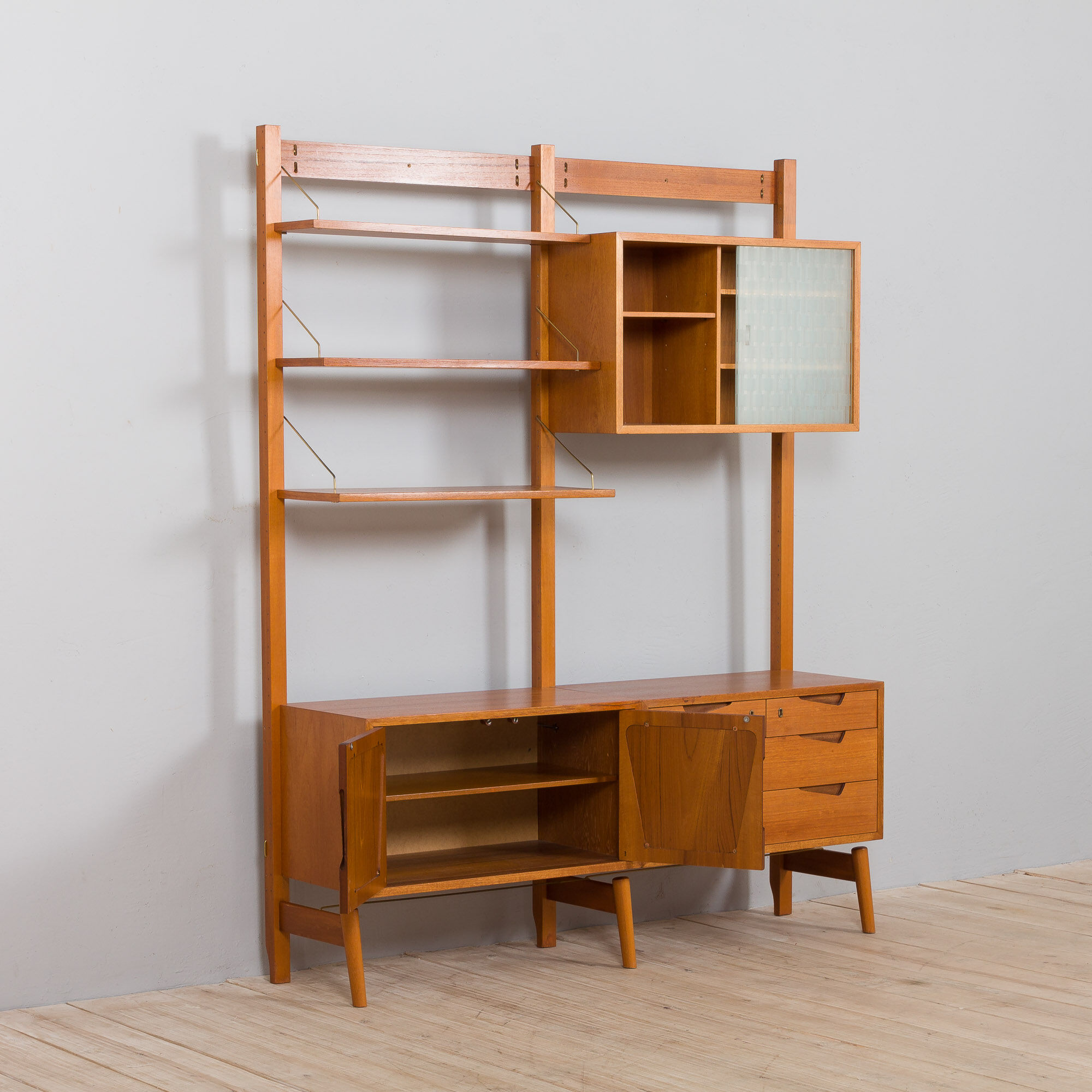 Rival 2 bay free standing teak wall unit with 3 cabinets and 3 shelves by Brodrene Jatogs Norway, Kj