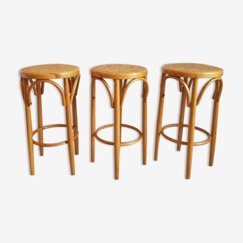 Suite de 3 tabourets de bar cannés vintage