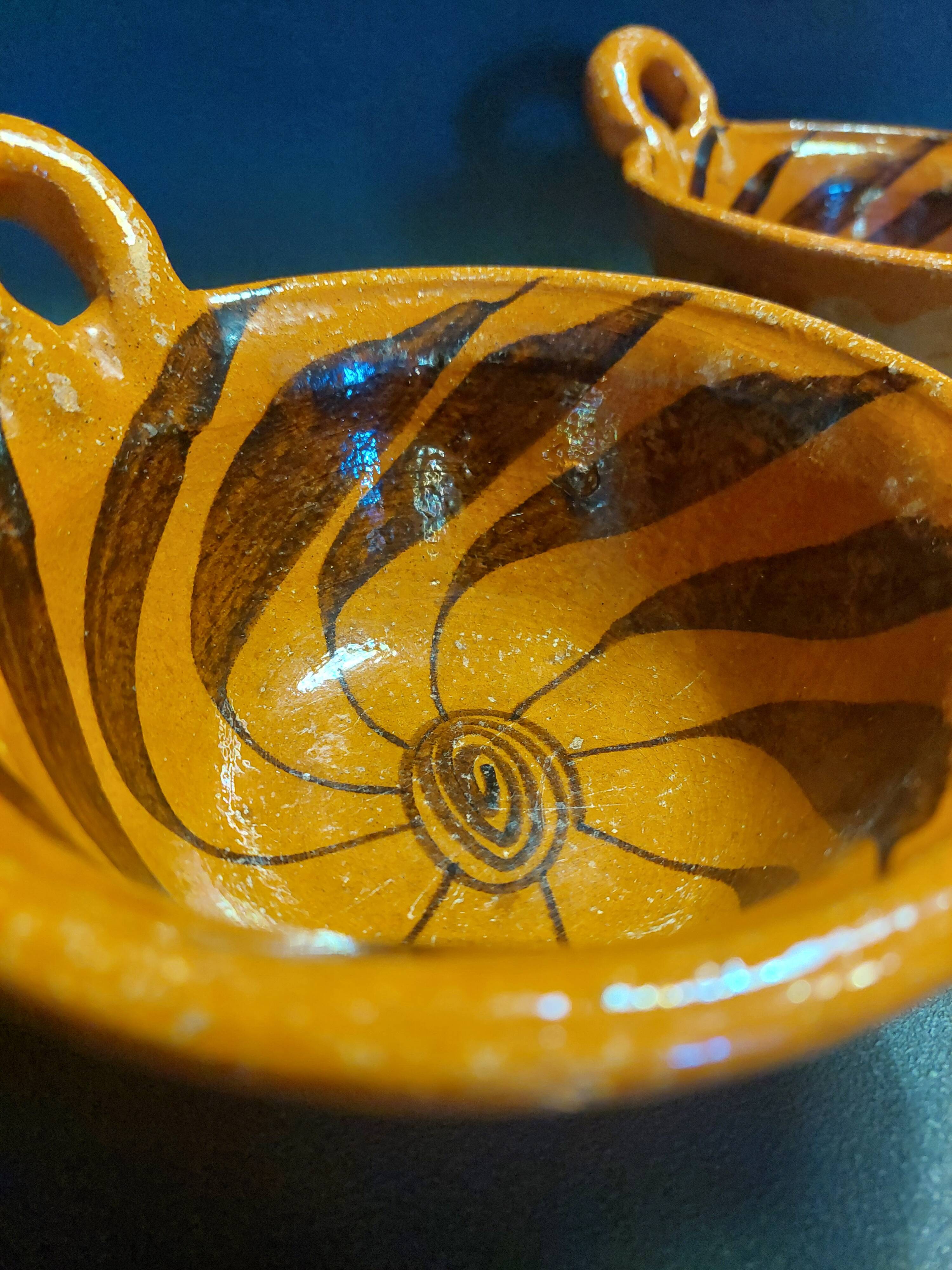 Pair of handled bowls, glazed terracotta, Mexico, mid-20th century.
