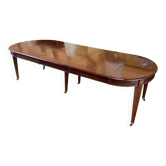 Table de salle à manger extensible Louis XVI en acajou à bandeau -19° siècl