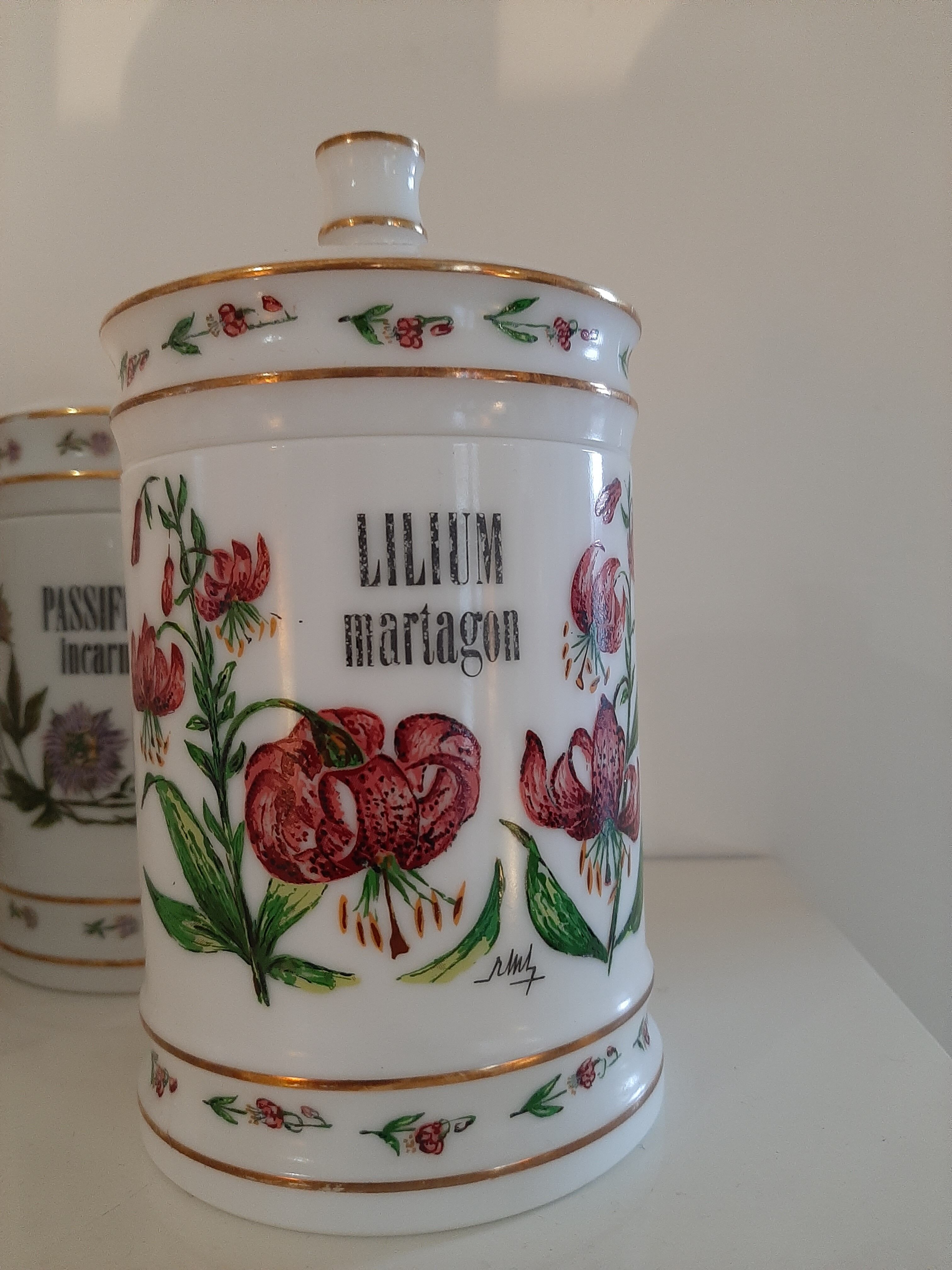 Series of 7 pharmacy jars in opaline