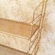 Brass gold metal wall shelf