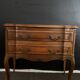 Carved wooden chest of drawers