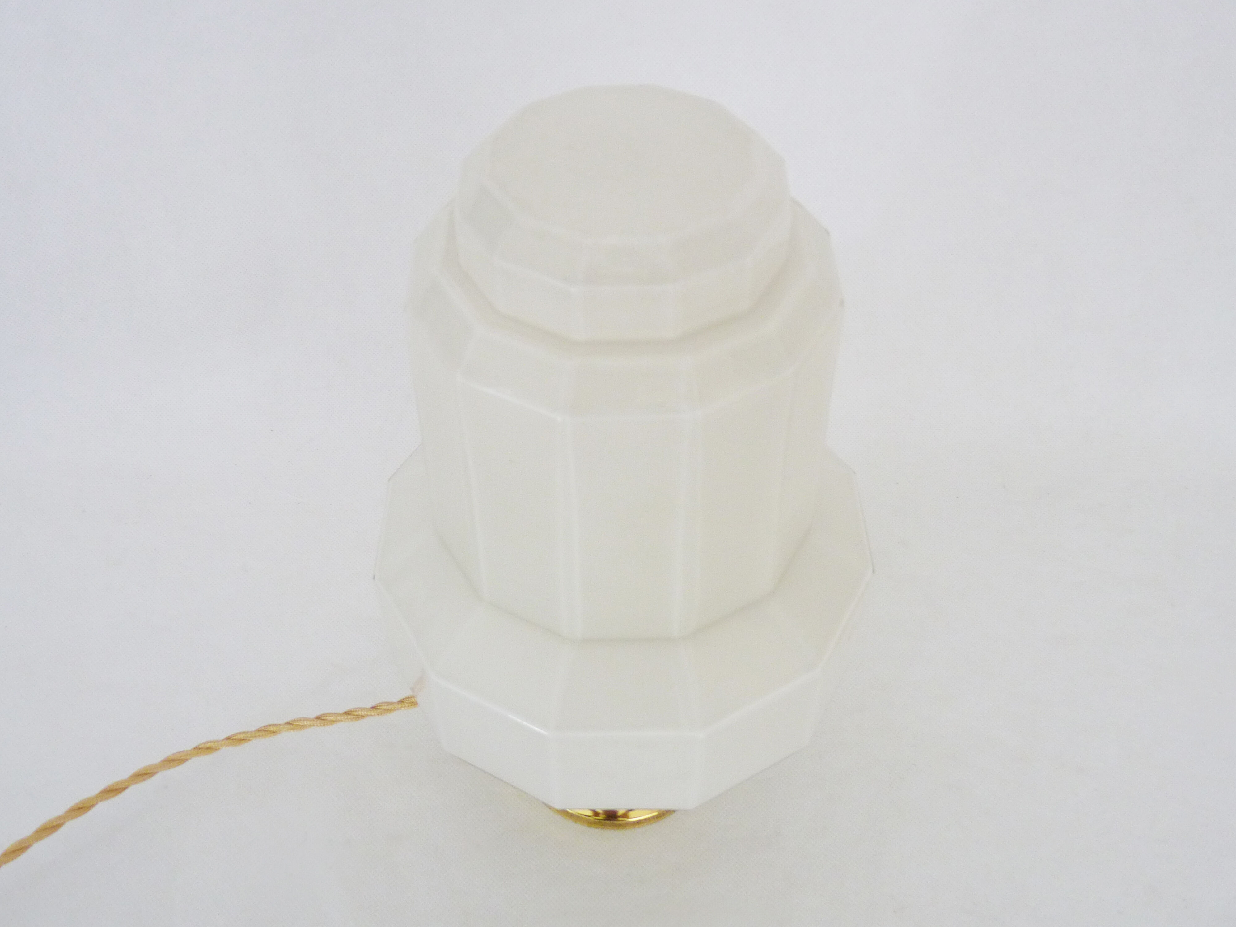 Skyscraper lamp in opaline and brass foot. Globe Art Deco