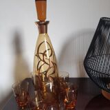Amber crystal decanter and 5 matching glasses.