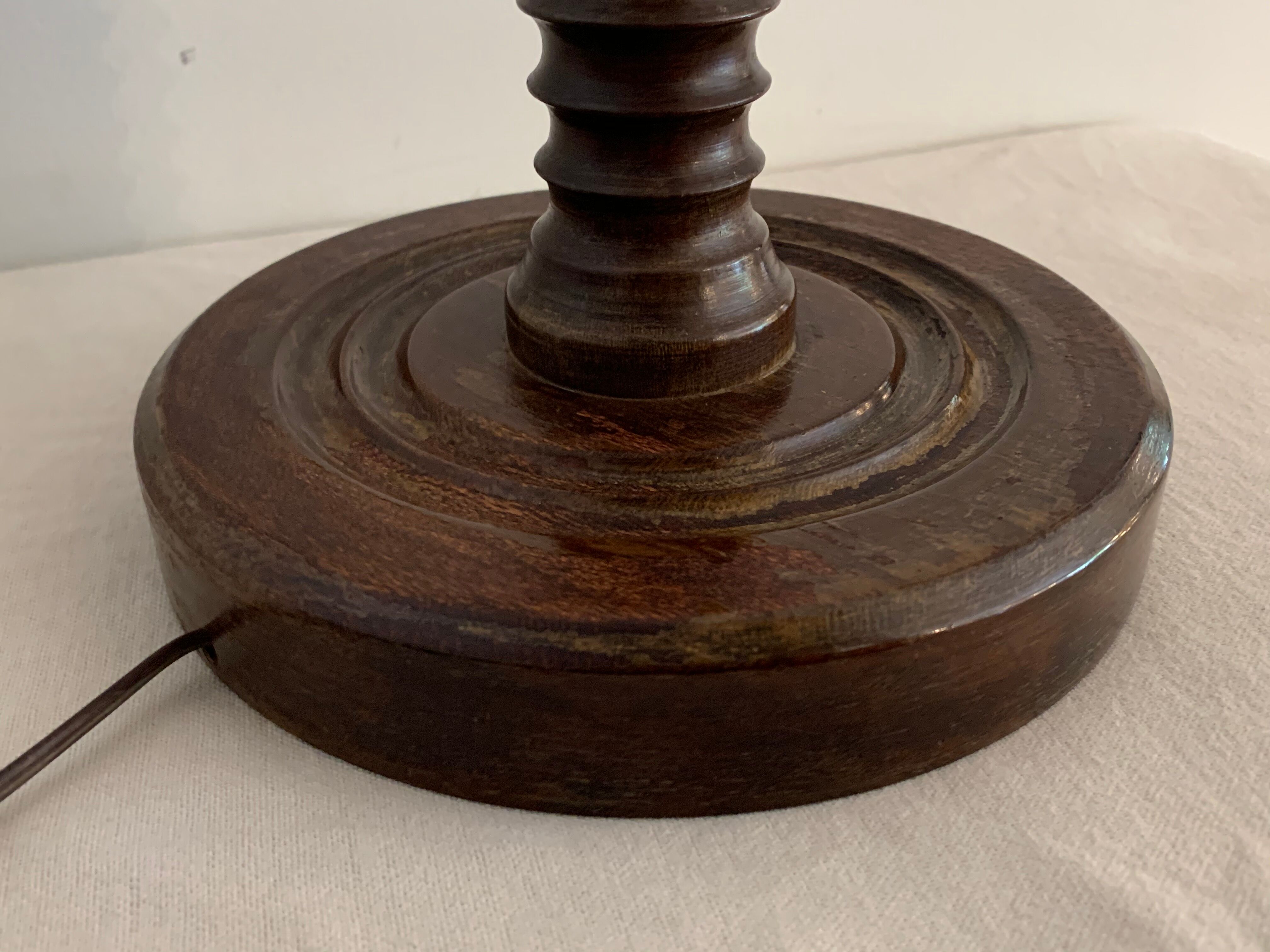 Turned wooden lamp foot in the shape of a warhead