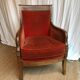 Fauteuil Bergère aux dauphins noyer