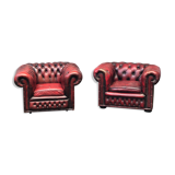 Pair of red leather chesterfield chairs