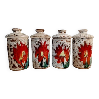 Set of 4 lava pots with flower decoration