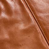 Ottoman with leather upholstery