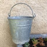 Old bucket in vintage zinc pot cache