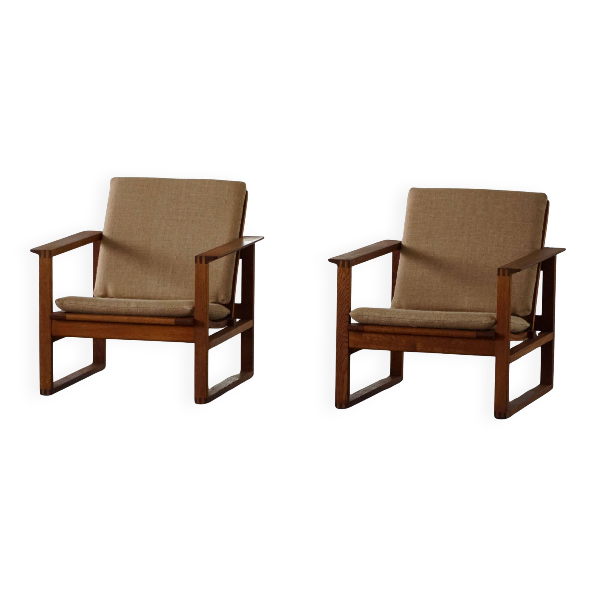 Børge Mogensen, a pair of BM2256 lounge chairs in oak and jute, Denmark, 1960s.
