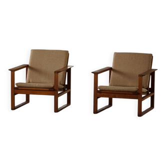 Børge Mogensen, a pair of BM2256 lounge chairs in oak and jute, Denmark, 1960s.