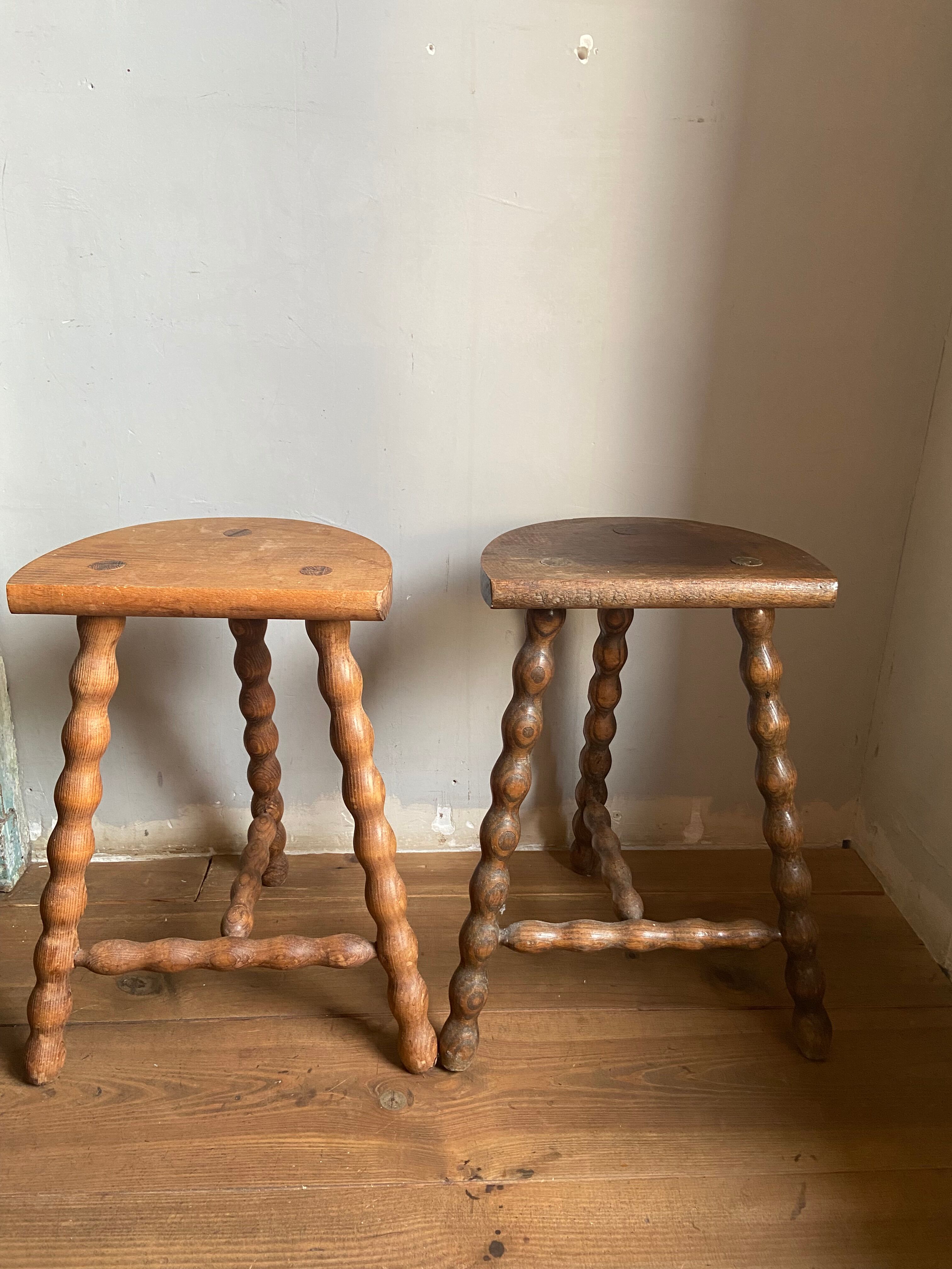 Pair of wooden milkman's stools turned brutalist