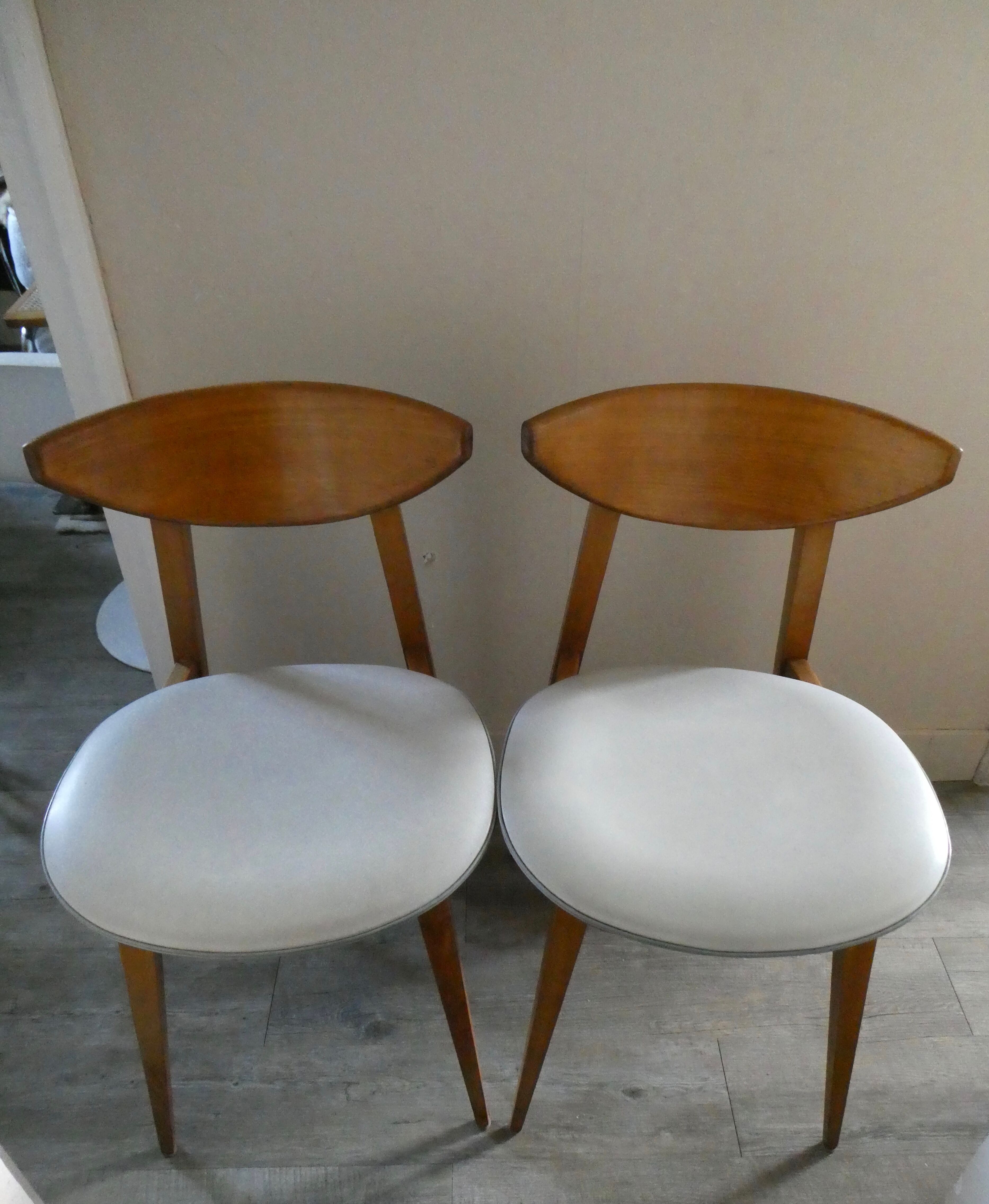 Pair of wooden chairs and skai scandinavian style