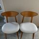 Pair of wooden chairs and skai scandinavian style