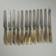 11 cheese/dessert knives with horn and steel handles, T-D Paris