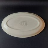 Longchamp dish with bird