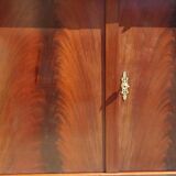 Flamed mahogany enfilade with sea green marble in Empire style.